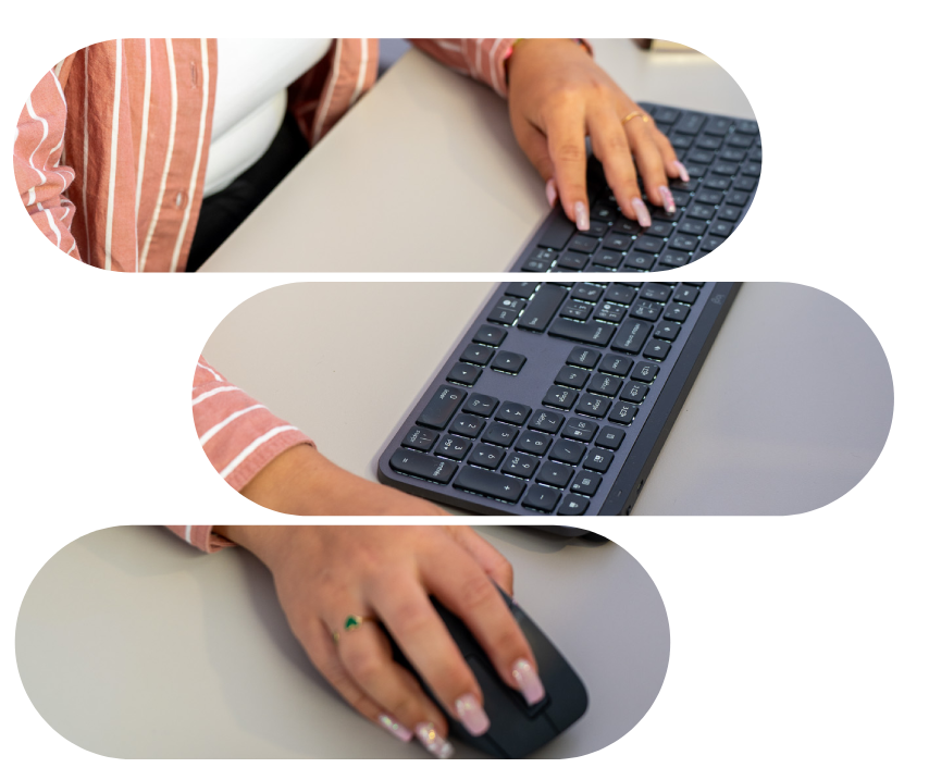 mains d'une membre de l'équipe de l'agence web Qwery entrain de taper sur un clavier d'ordinateur